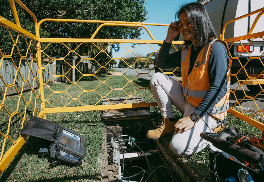 nbn technician Maria working in pit