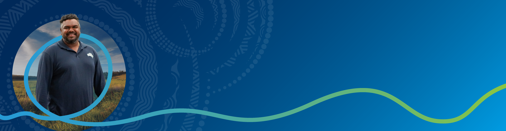 First Nations man wearing nbn branded long sleeved shirt next to 'Connecting First Nations to Telco' wording